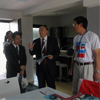 SD China 2013 updates: PKU leaders visit solar houses